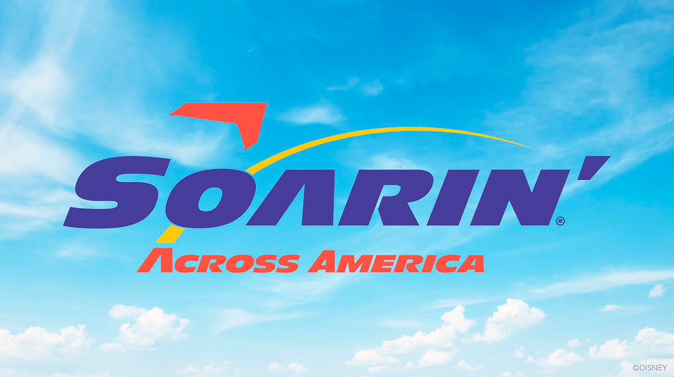 a blue sky with clouds and a logo